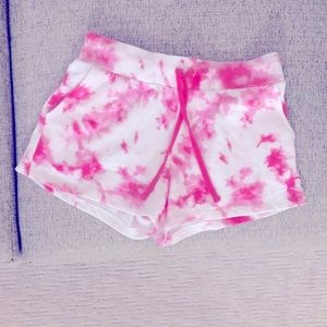 Disney jogging shorts, pink tie-dye size small.
